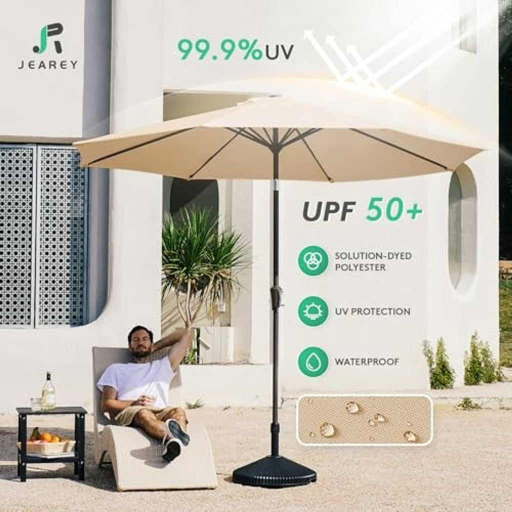 Beige patio umbrella with UPF 50+ protection and waterproof fabric canopy