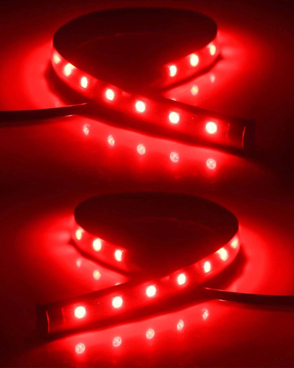 Two red LED light strips glowing with multiple diodes on flexible tubing