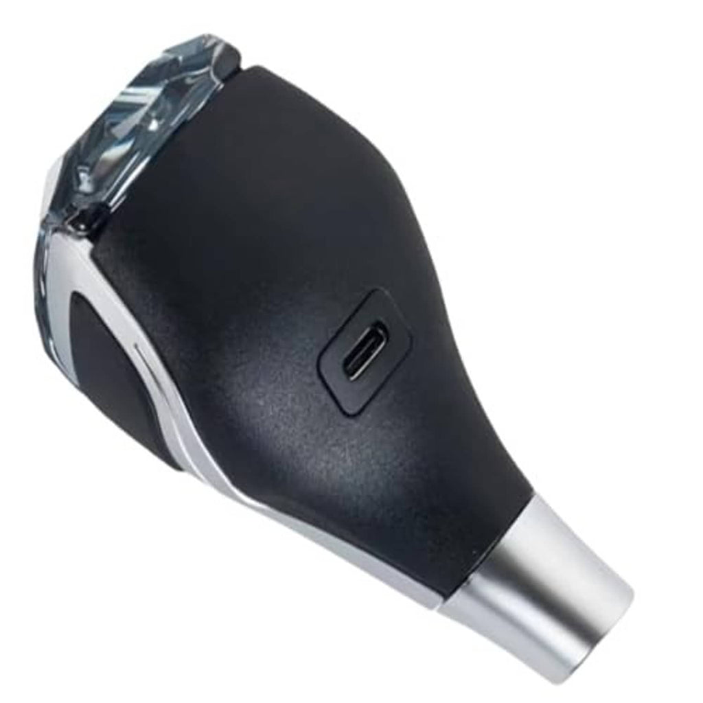 Illuminated touch-activated gear shift knob with black body and silver base