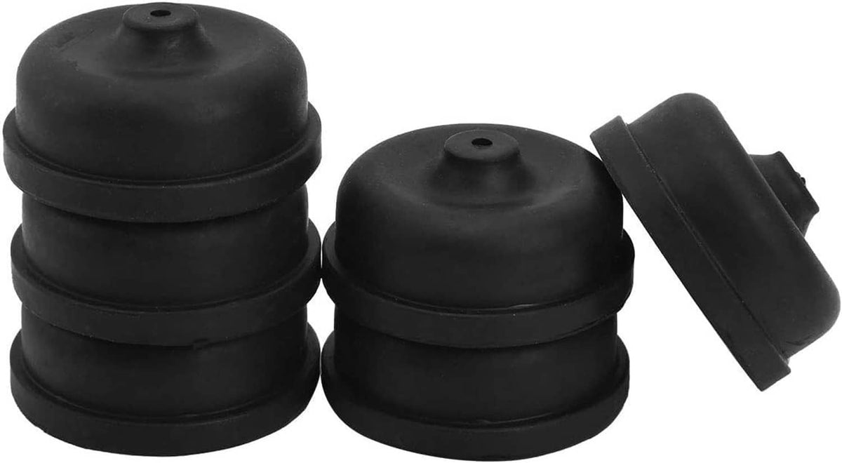 Two black diaphragms stacked plus one dark rubber piece, center holes visible