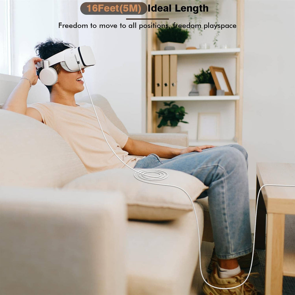 White VR link cable connected to a VR headset worn while relaxing on a couch