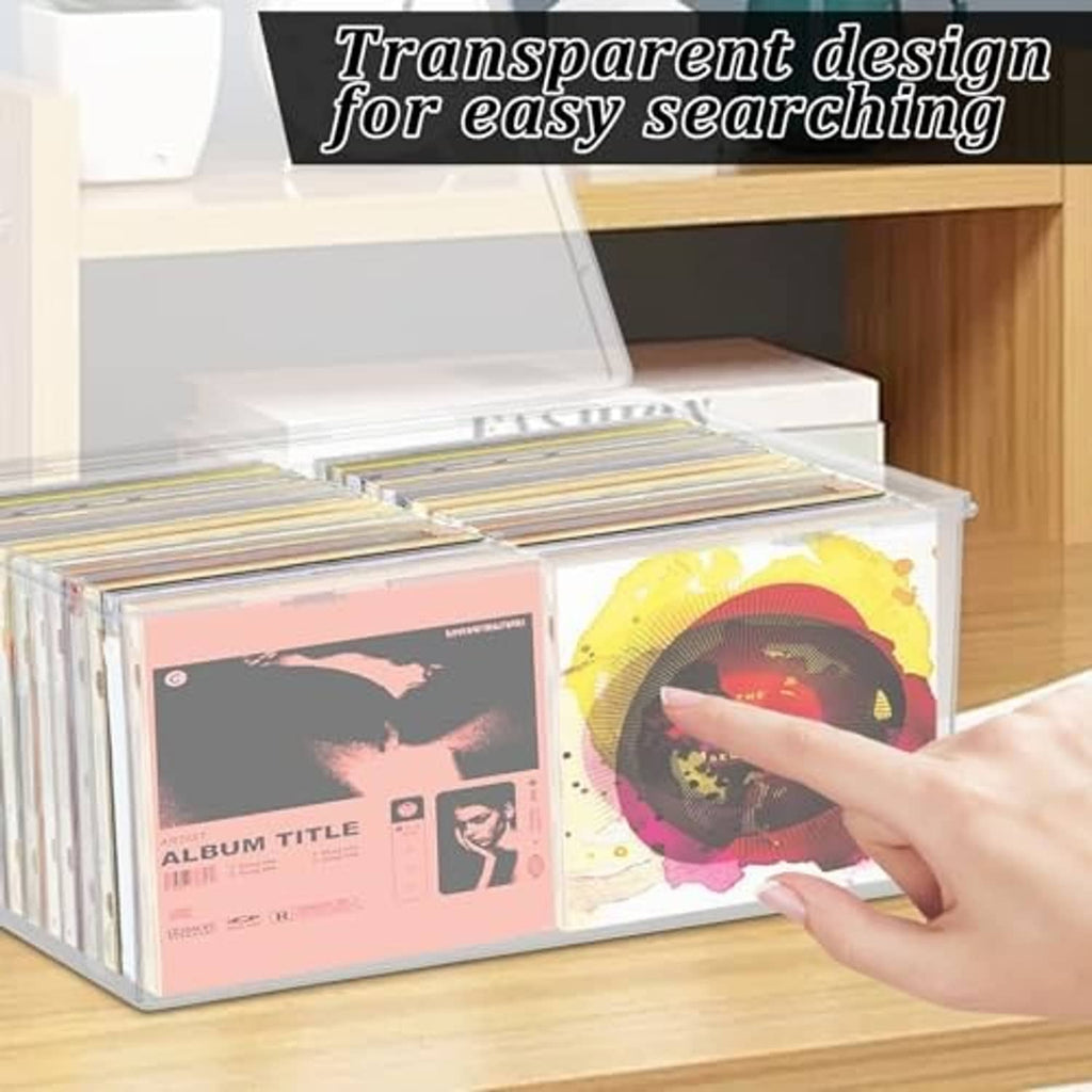 Clear CD storage box with open hinged lid, CDs inside and a hand reaching in