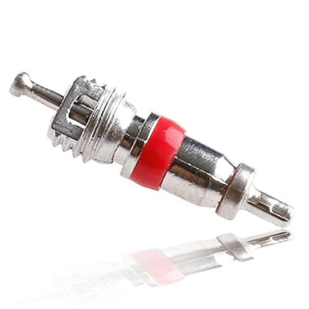 Close-up tire valve stem core with red rubber seal and silver metal housing