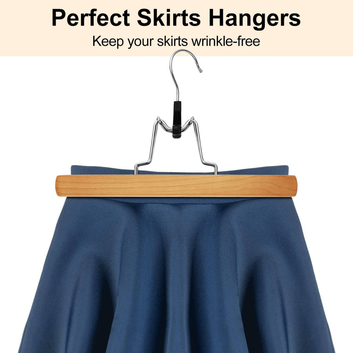 Natural wooden skirt hanger with metal frame holding a blue skirt