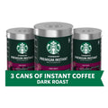 Starbucks Premium Instant Coffee dark roast: three stacked metal cans with green emblem.