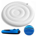 White inflatable towable boat inner tube with circular center and metal valve loop