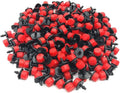 Small red and black drip irrigation emitters with adjustable flow tips