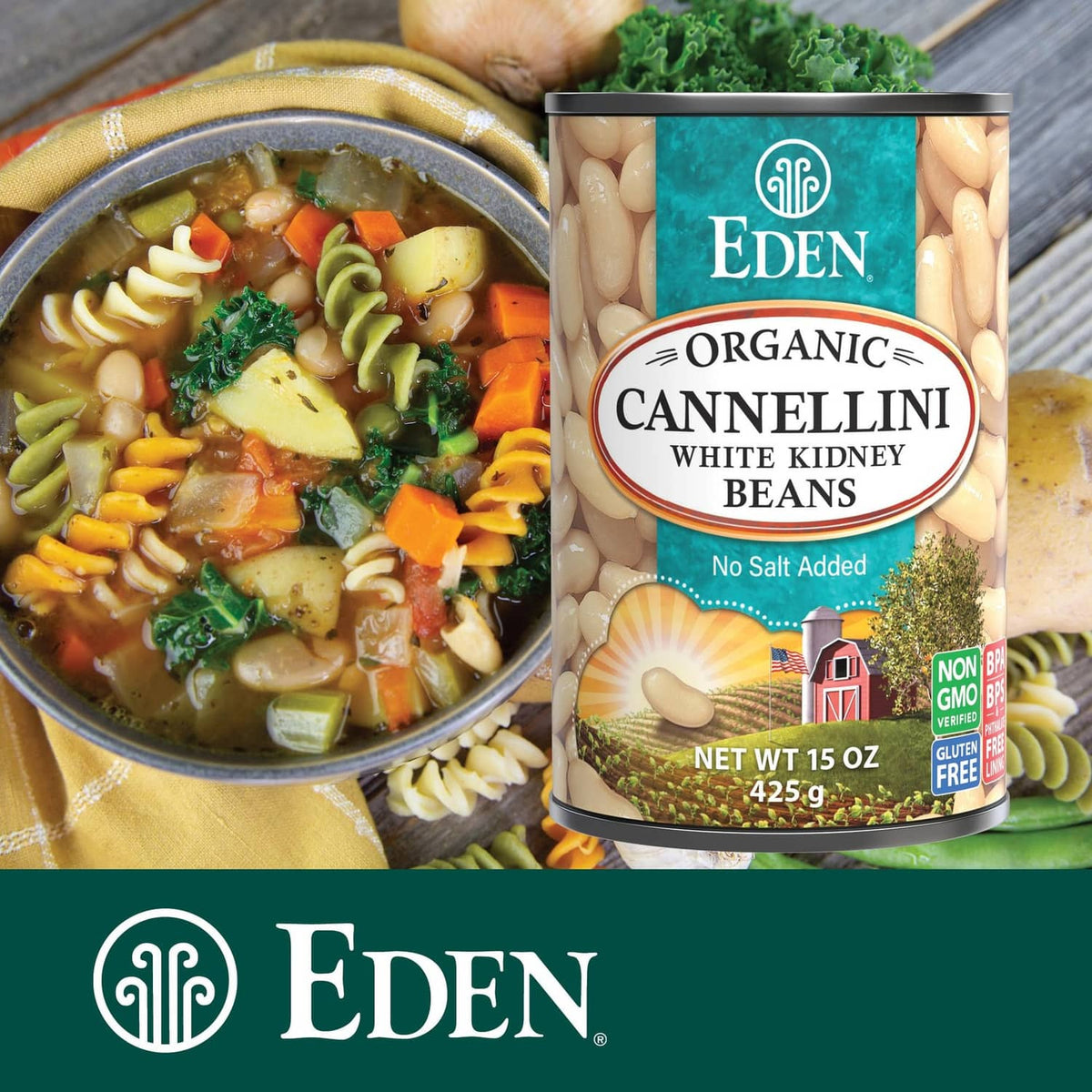 Organic cannellini beans can beside vegetable soup bowl, no salt added, 15 oz