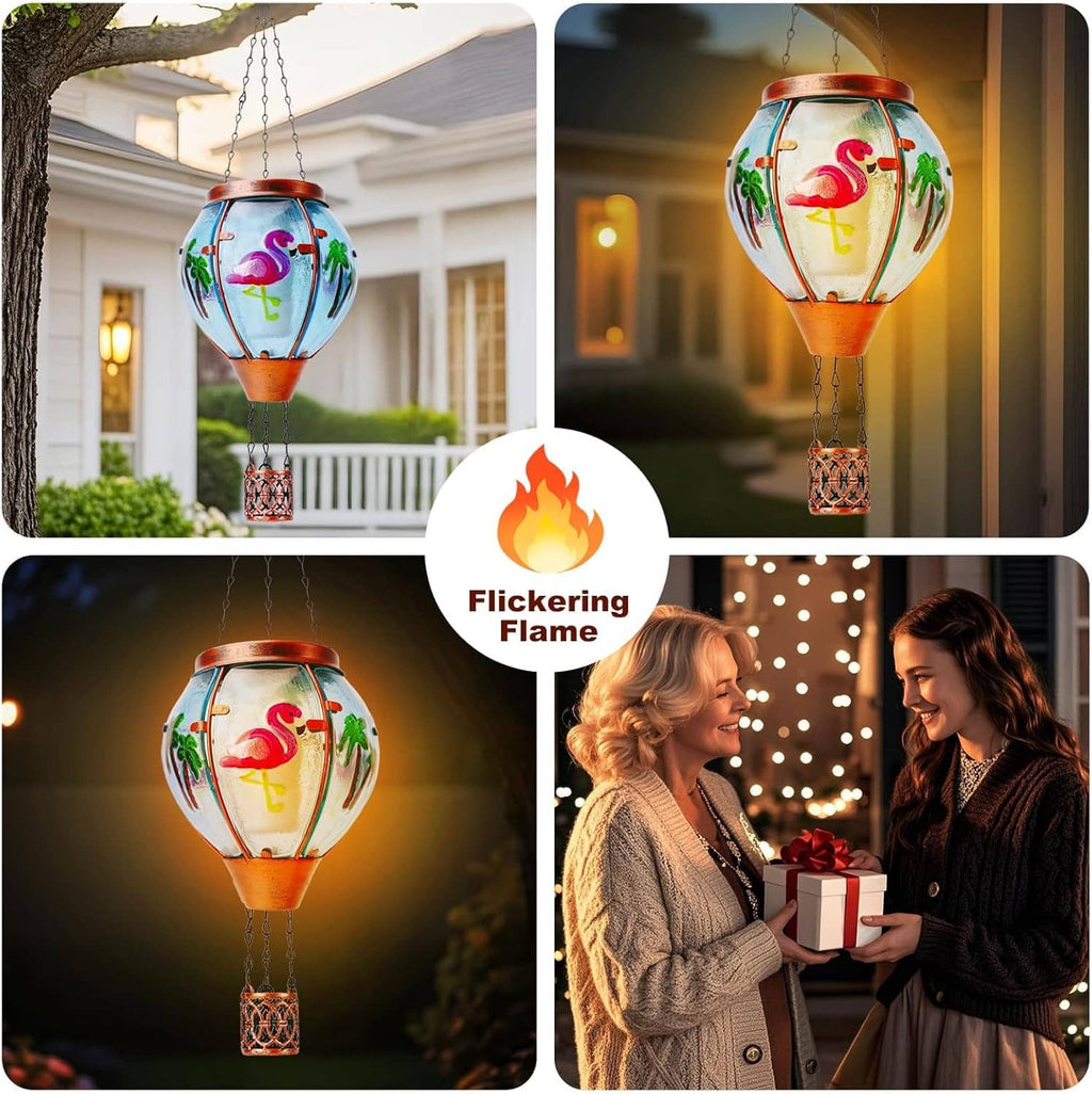 Solar flame-effect flamingo glass lantern with red metal hanging basket and warm flicker
