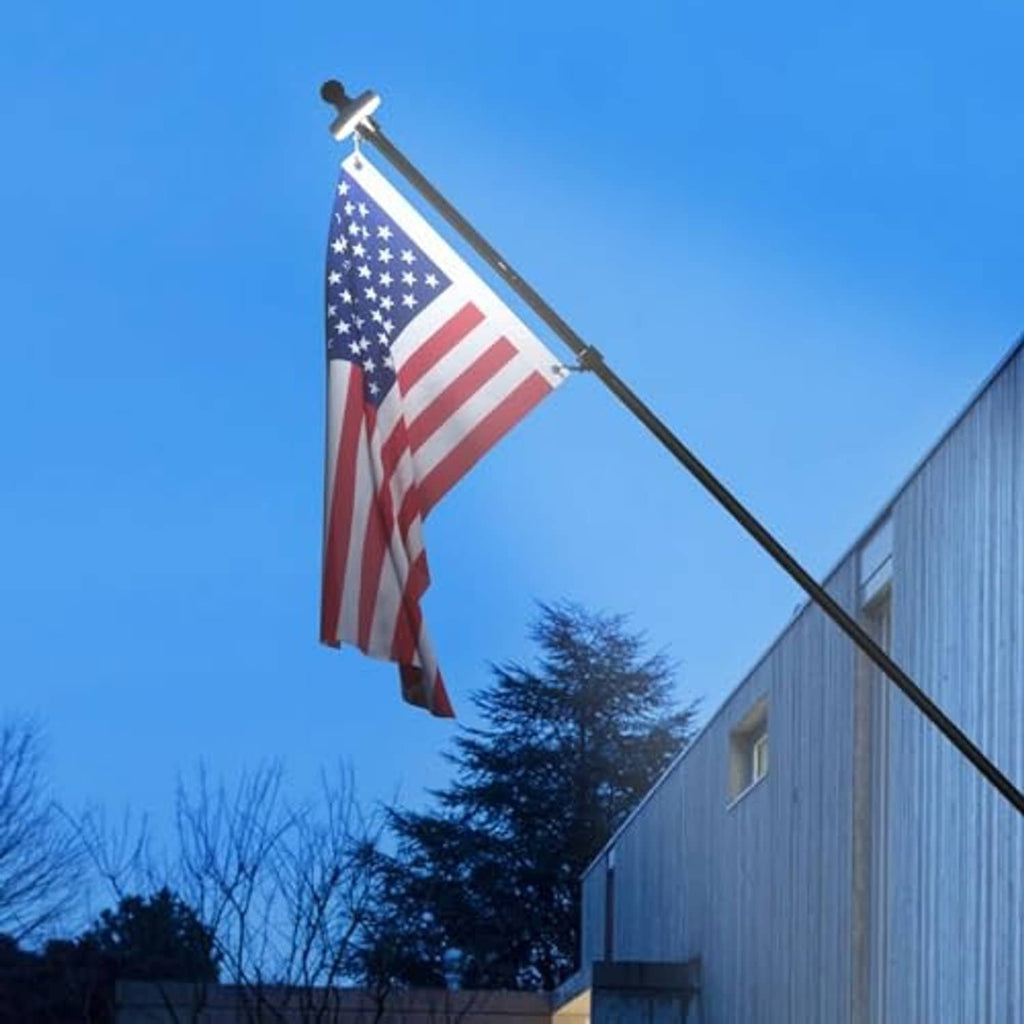 Black 5 ft flagpole with embroidered U.S. flag hanging from the pole