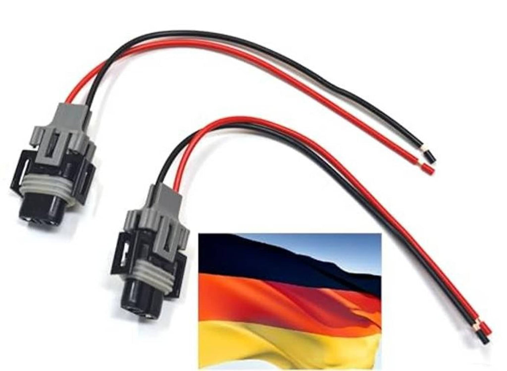 Wire harness with dual plugs and red/black insulated wires for headlight sockets