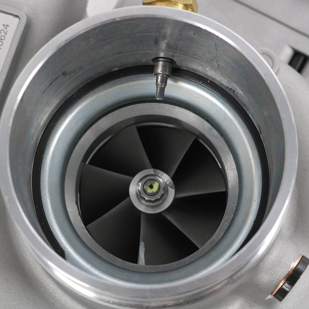 Turbocharger compressor wheel with silver housing and black blades