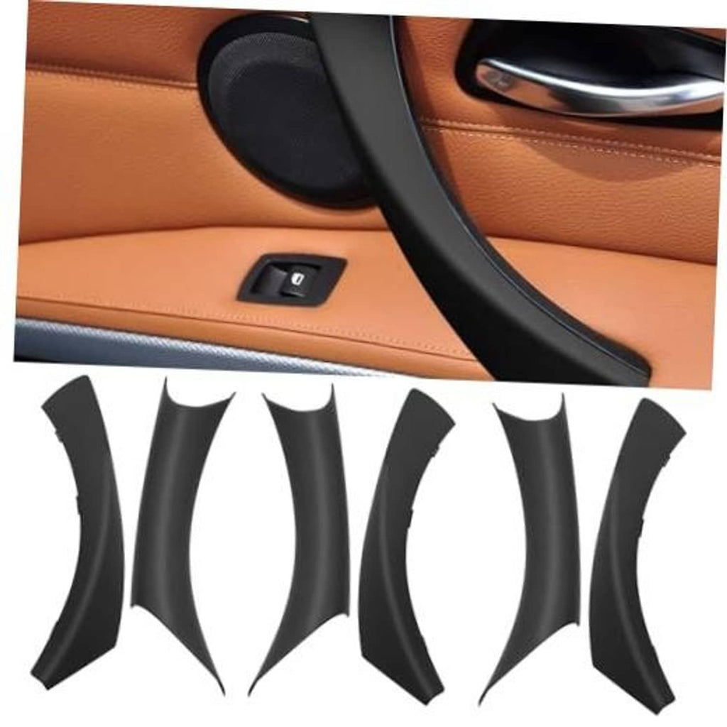 Black door handle cover set on car door panel, with window switch control visible.