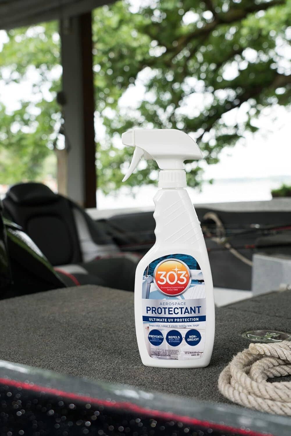 UV protectant spray bottle standing outdoors on a seat cushion