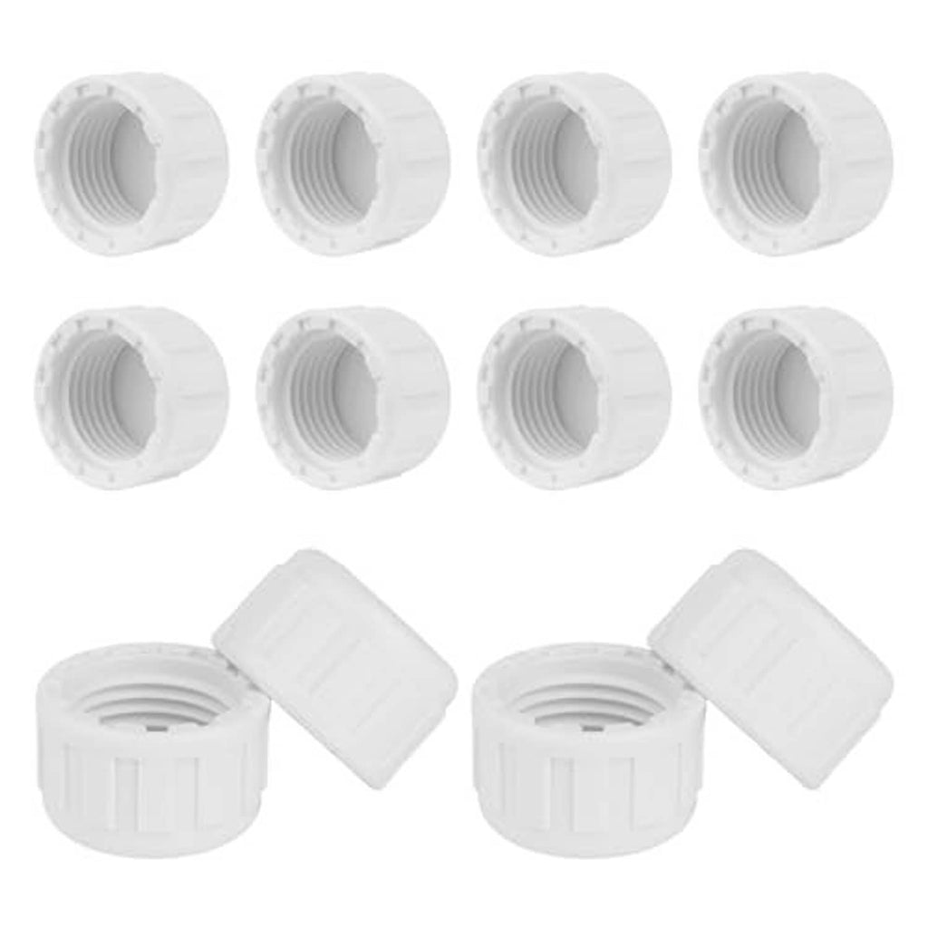 Twelve white PVC sprinkler caps with 1/2-inch female-thread plug openings