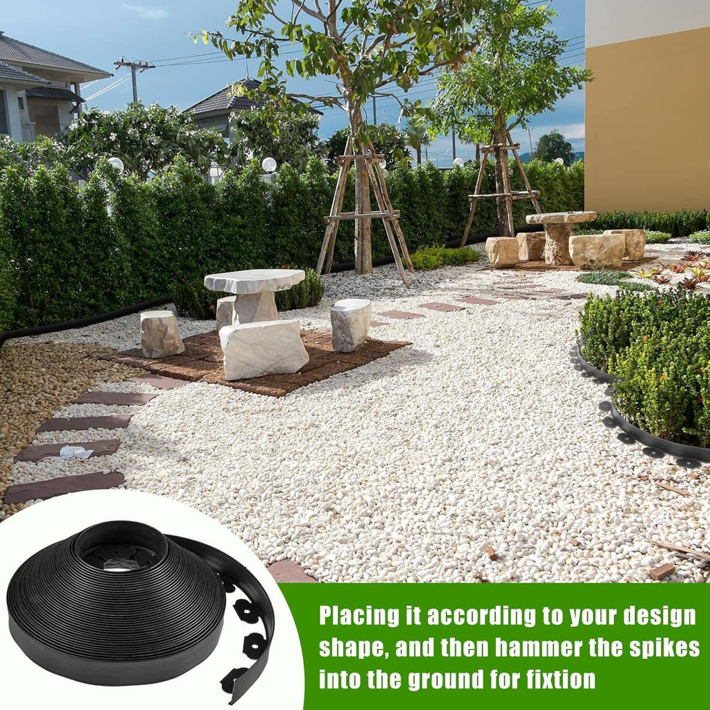 Black landscape edging installed along a gravel path corner, with coil bundle nearby.