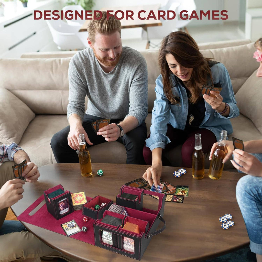 Trading card deck box on table while players handle game cards and decks during play.