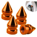 Set of four orange spiked aluminum tire valve caps, cone shape with threaded tops