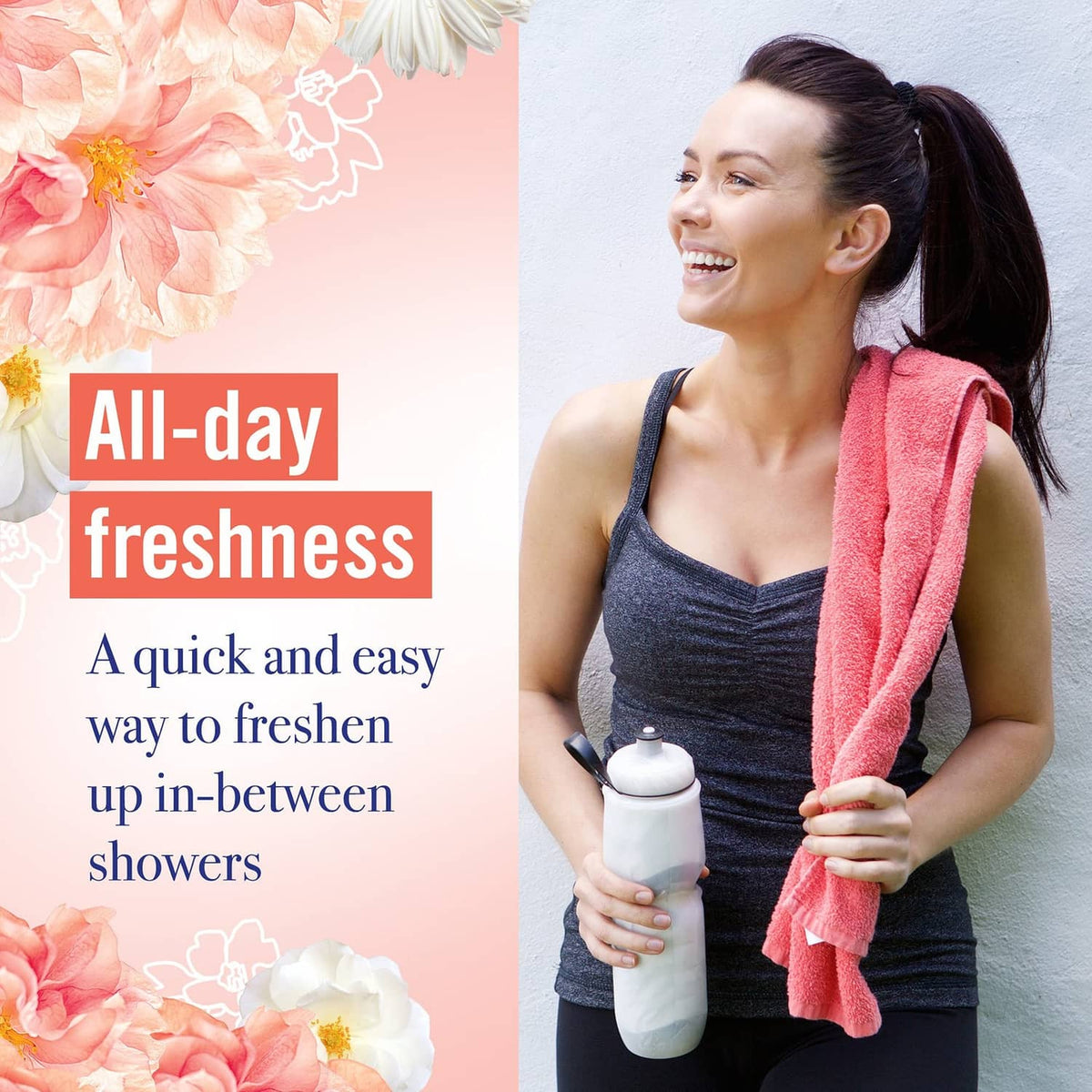 Vagisil dry wash deodorant spray bottle in hand with orange cap, peach blossom scent