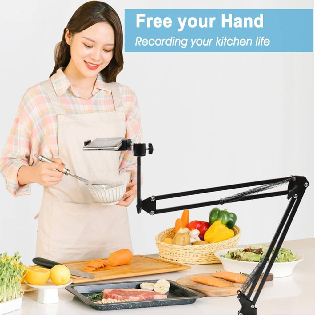 Black overhead tripod mount arm with clamp holding phone above kitchen prep