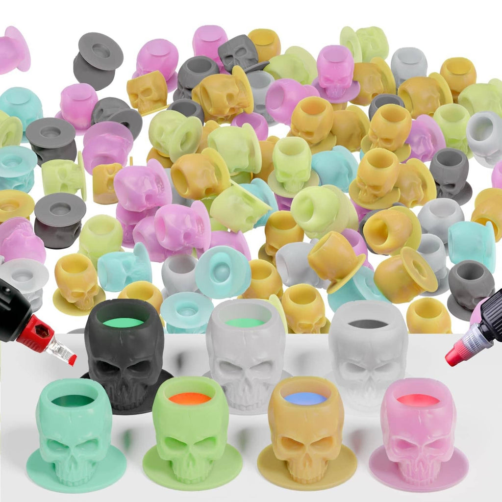 Mixed-color silicone tattoo ink cups with skull-shaped bases, 200-pack assortment.