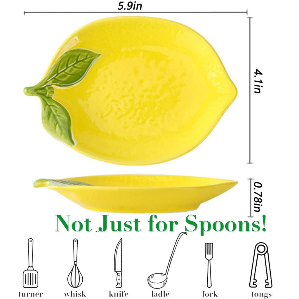 Yellow ceramic lemon-shaped spoon rest with green leaf accent, 2-piece design