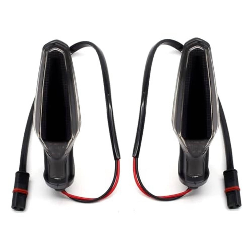 Pair of motorcycle turn signal lights with clear smoked lenses, black housings, and leads