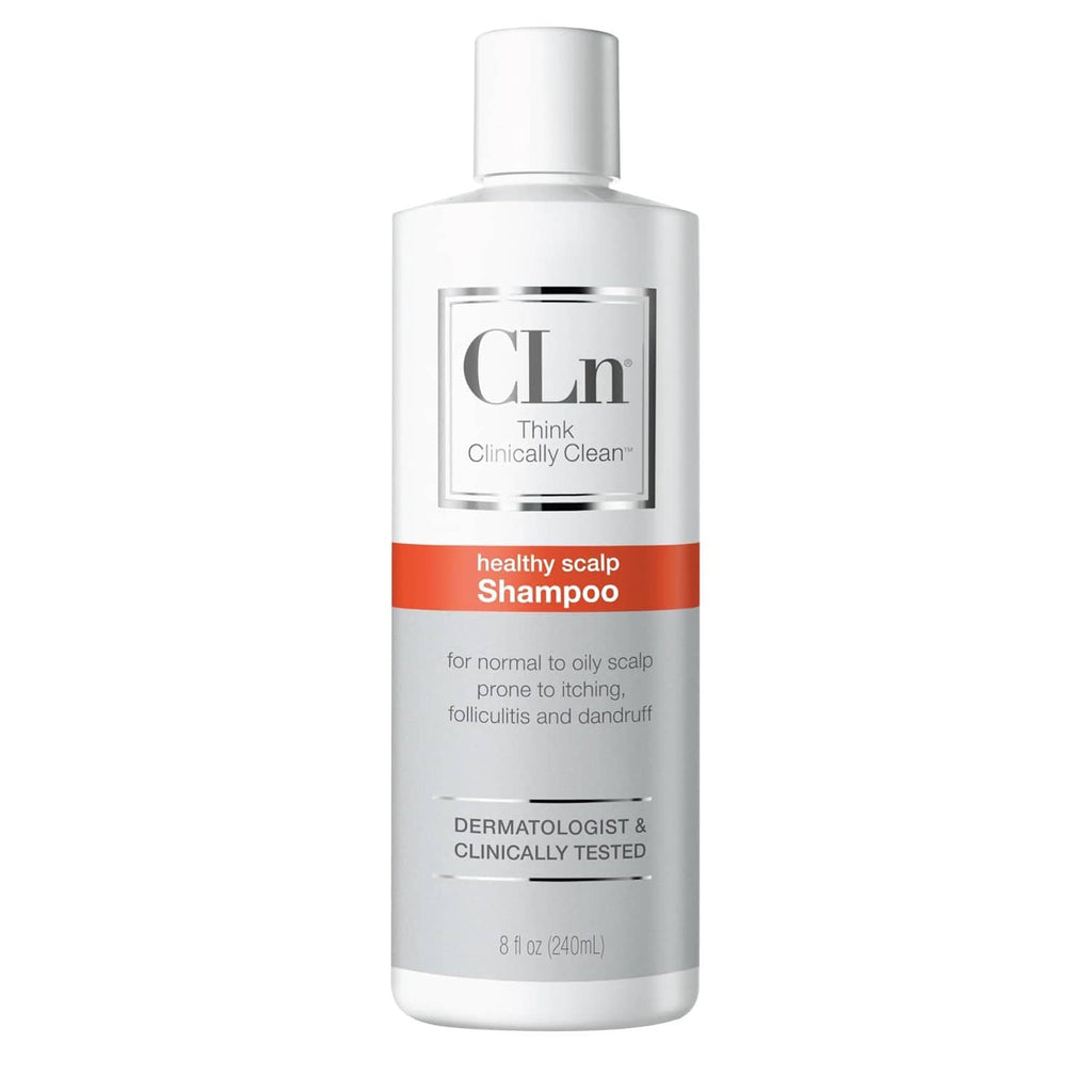 CLn clarifying scalp shampoo bottle with white cap and orange label band