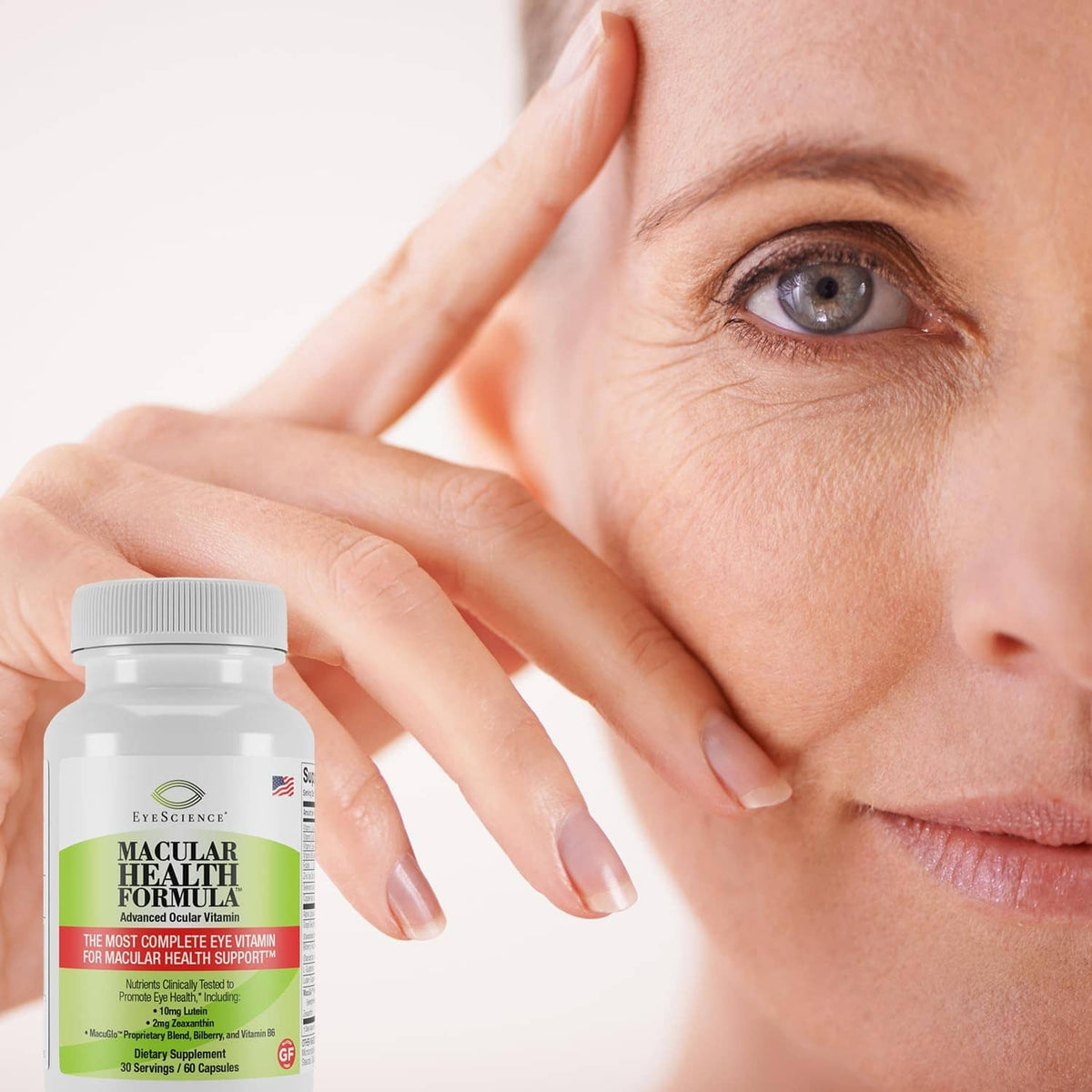Macular Health Formula supplement bottle beside a person’s face