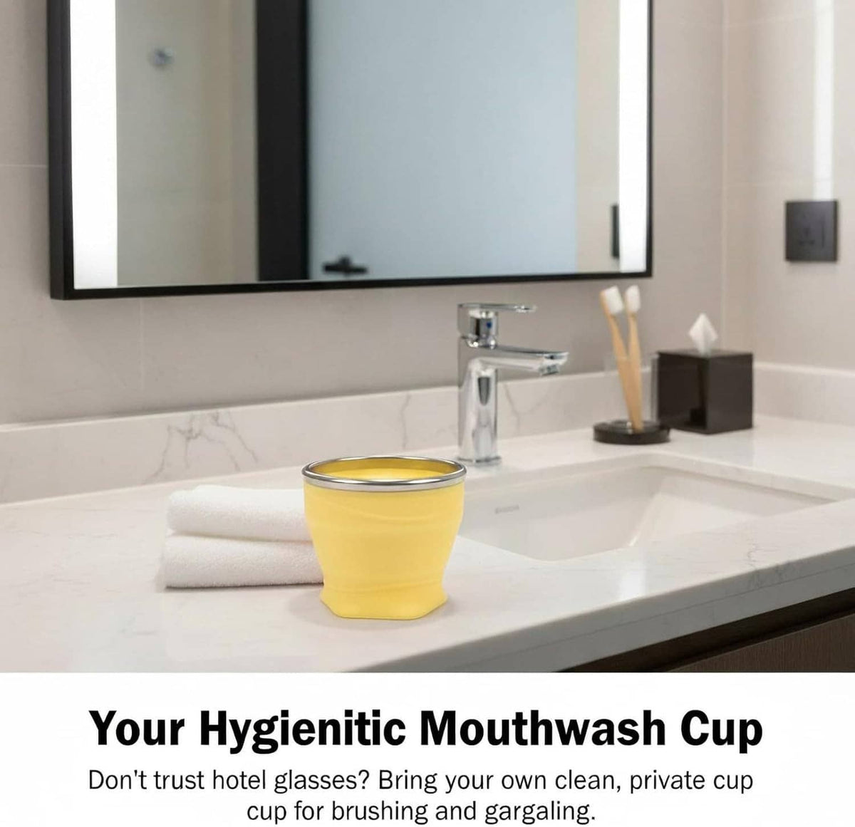 Yellow silicone collapsible travel cup with lid and metallic rim on a bathroom counter