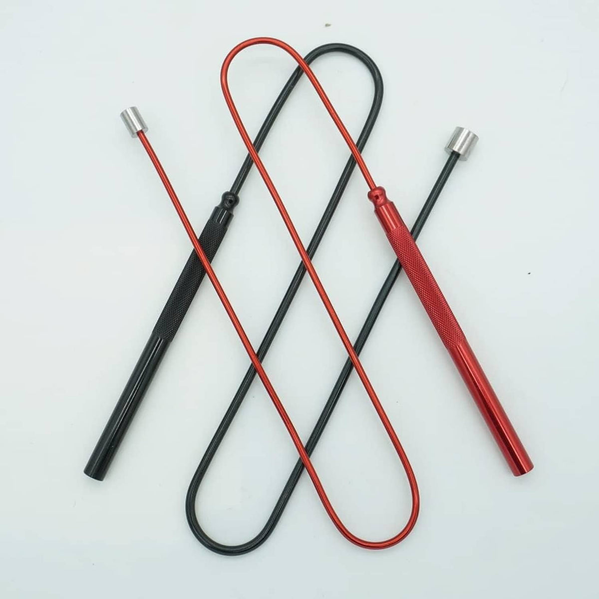 Magnetic pickup tool set with red and black bendable rods