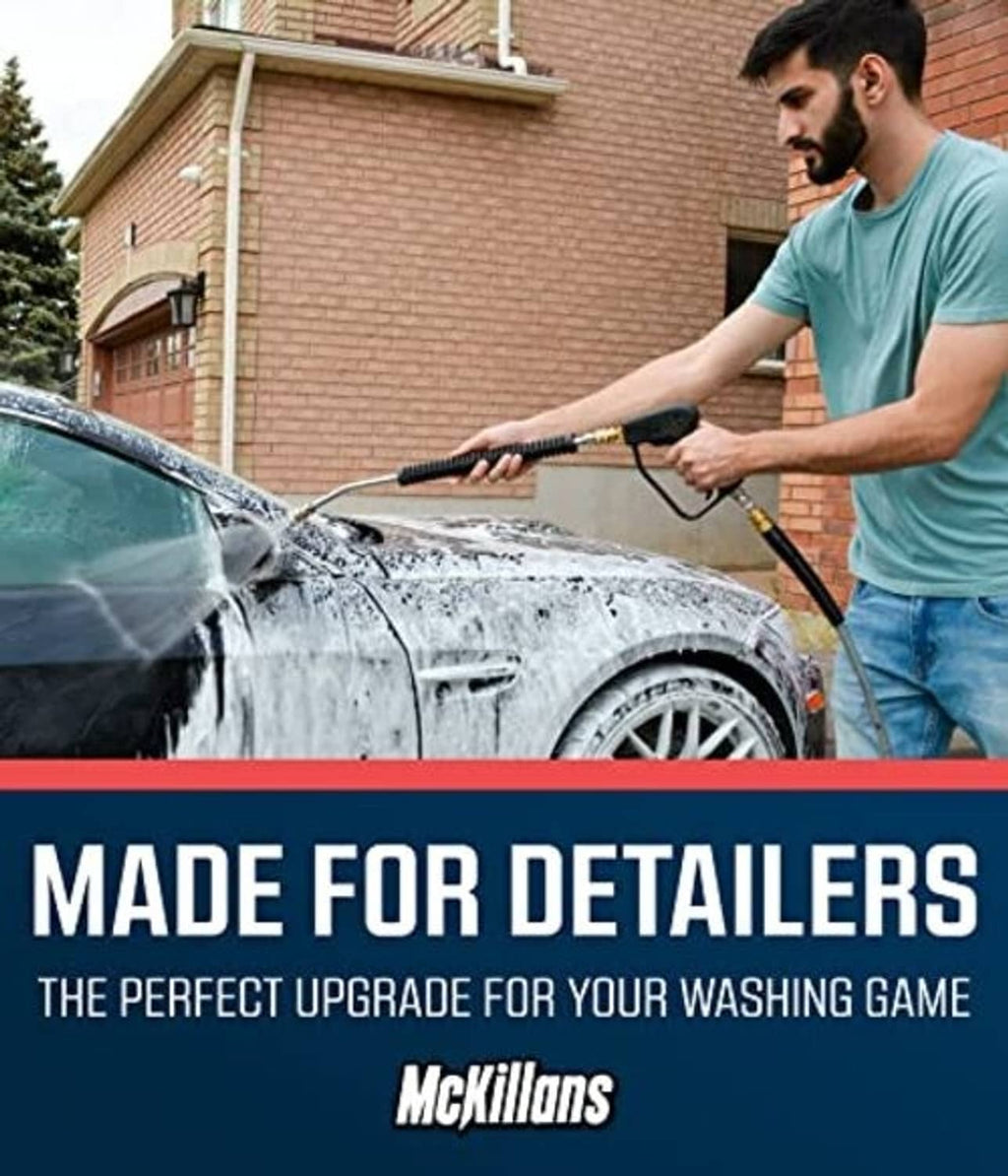 Pressure washer extension wand rinsing a car with a steady water spray