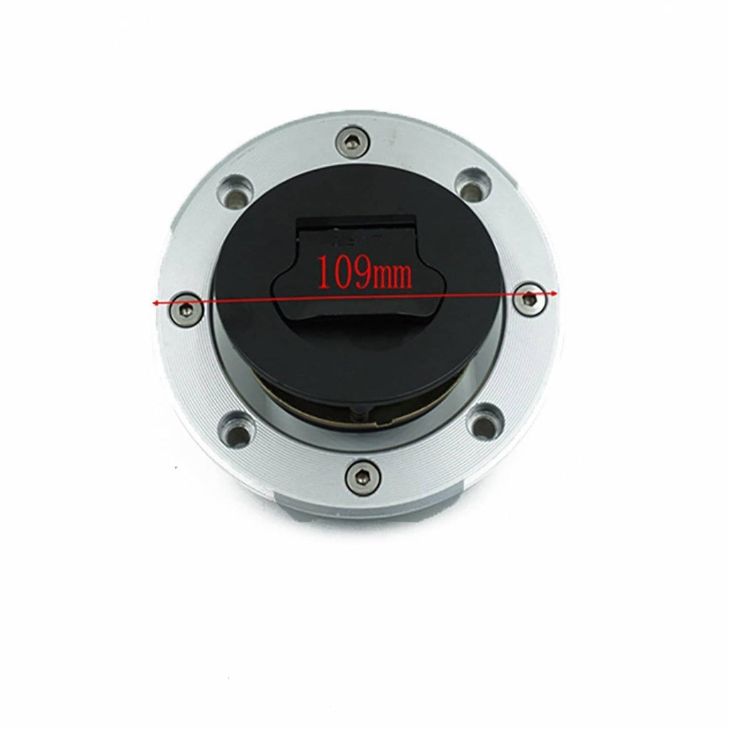 Ignition switch lock with round silver housing and black key cylinder, top view