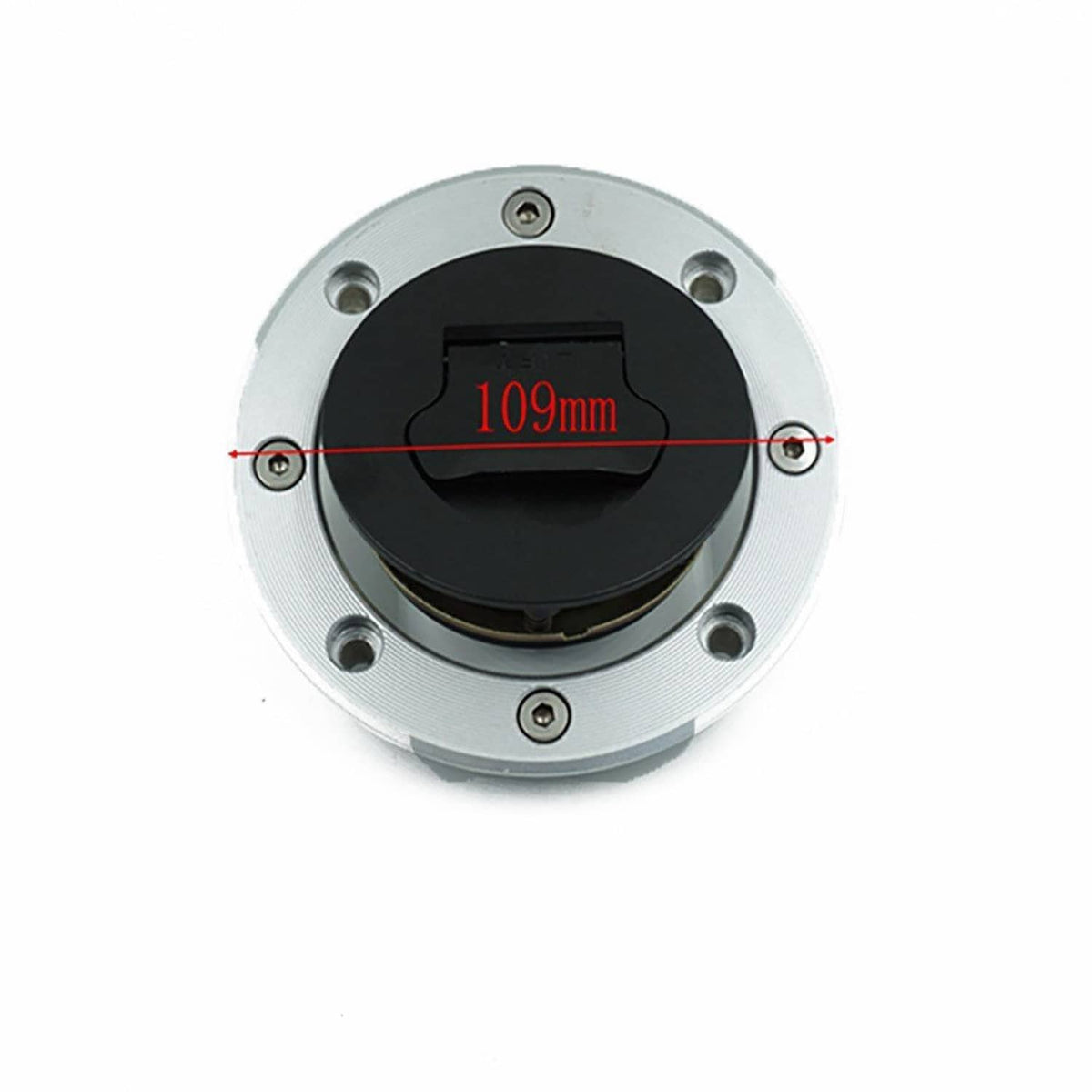 Ignition switch lock with round silver housing and black key cylinder, top view