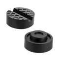 Pair of black rubber jack pads with textured grip channels and cross pattern.