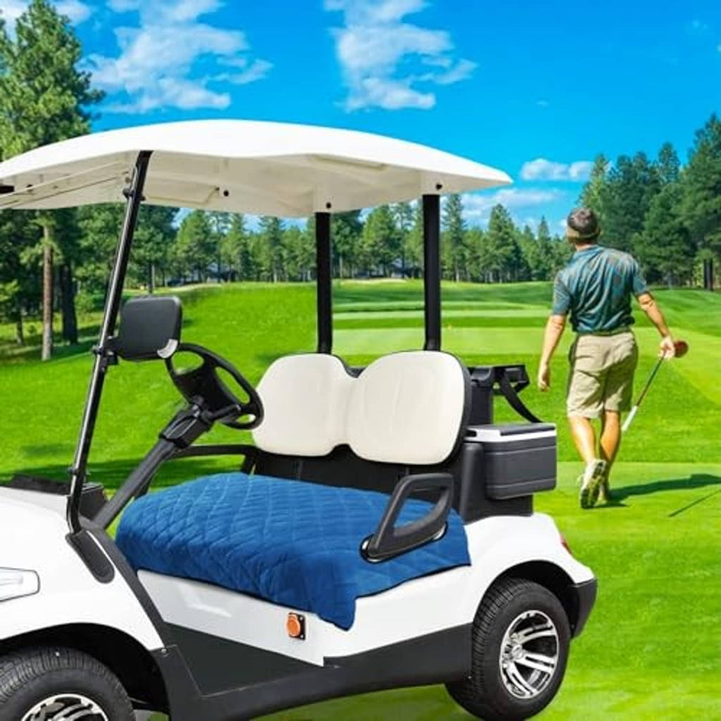 Blue seat cover blanket on golf cart bench with white headrest pad