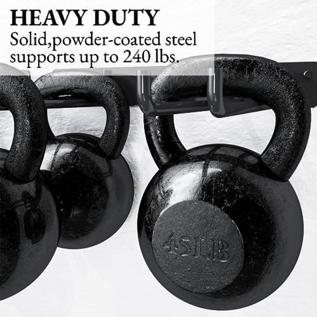Black heavy-duty metal rack hooks holding kettlebells for weight storage