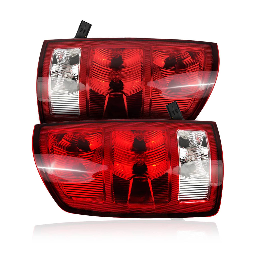 Pair of red rear taillights with clear sections and amber bulb lenses.