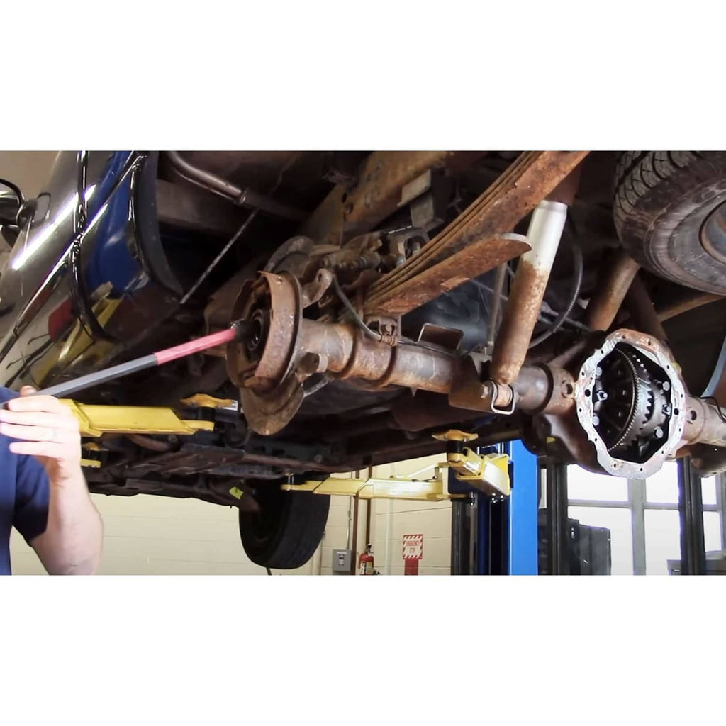 Differential bearing wrench used on vehicle differential, black shaft with red grip handle
