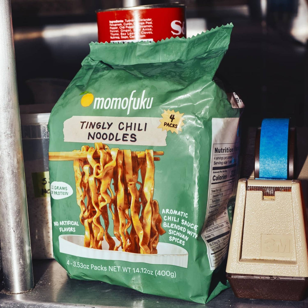 Tingly chili ramen noodle bag on shelf among other pantry containers