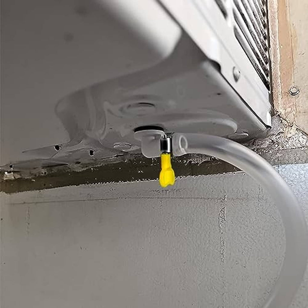 AC drain hose kit connected under the unit, releasing condensation into the drain