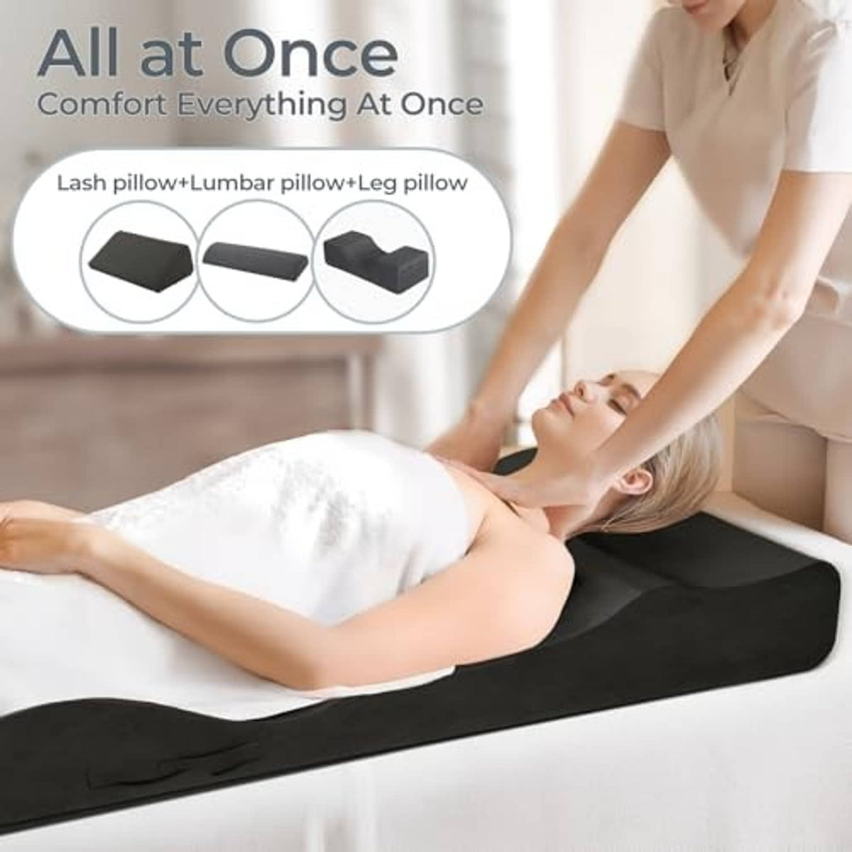 Black lash bed topper on massage table, contoured cushion for supportive positioning