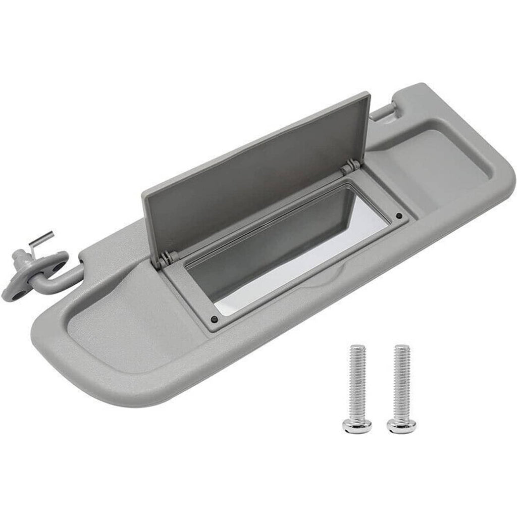 Light gray left driver-side sun visor with extended mirror cover and warning label