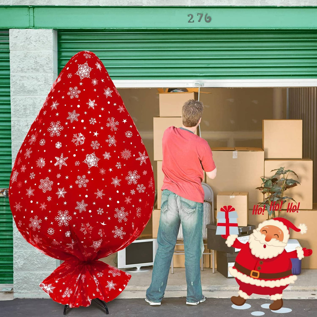 Red Christmas tree storage bag with white snowflakes, gathered bottom fabric, tied top.