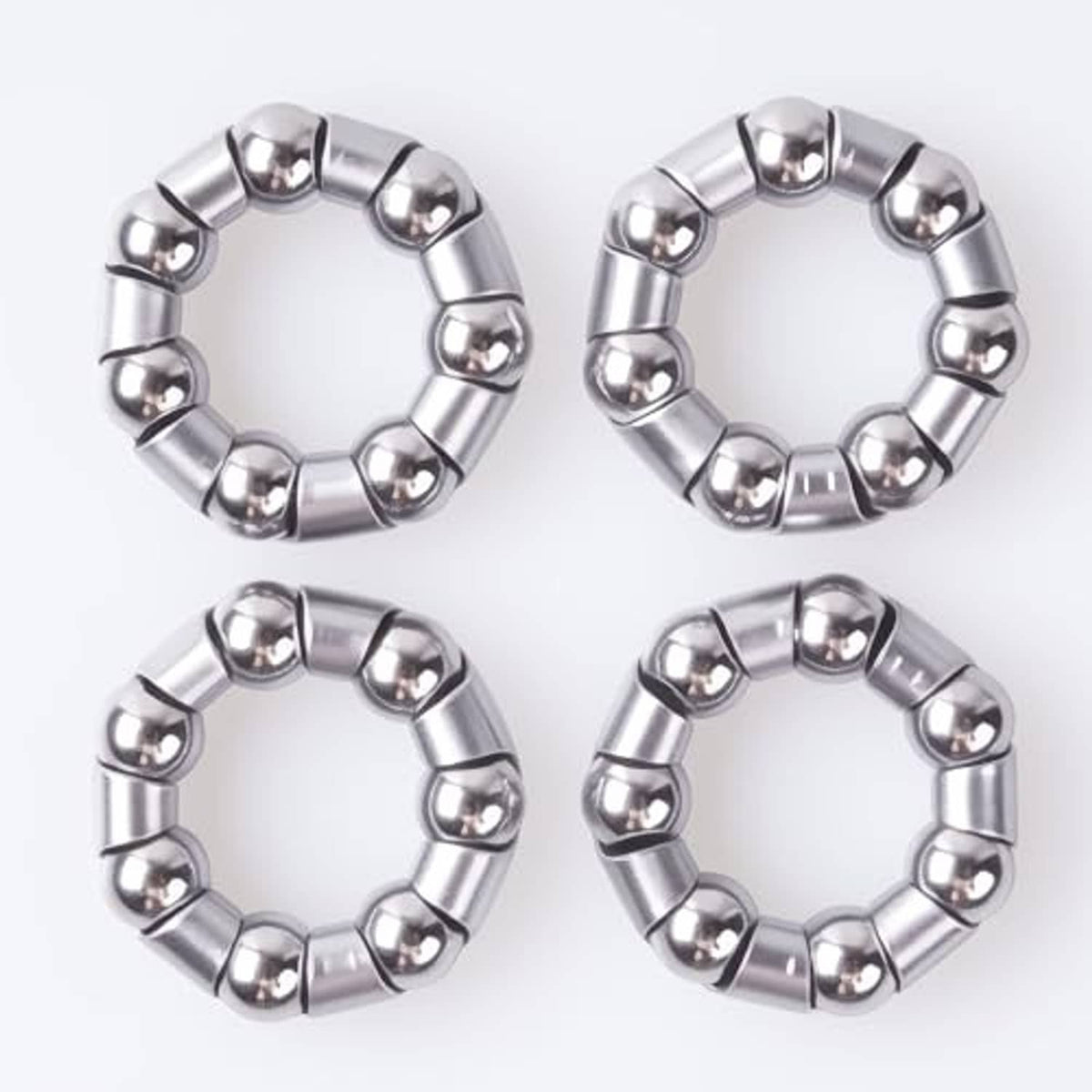 Chrome silver bicycle hub ball bearing rings, four round cages with metal balls