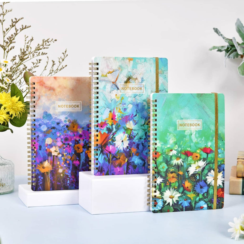 Set of three A5 watercolor floral spiral notebooks with gold spine trim