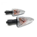 Pair of motorcycle turn signal lights with clear lens and amber reflector, black housing