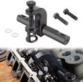 Black valve spring compressor tool with threaded screw, side handle, bolts, and washers
