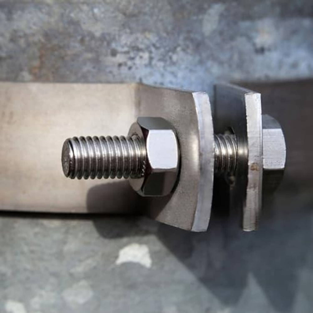 Stainless steel hex nuts on a threaded rod, showing nut thickness and fit
