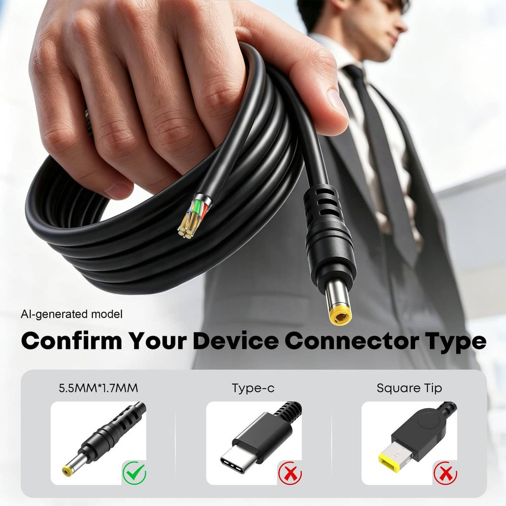 Black charger cable with slim DC barrel tip connector held in hand.